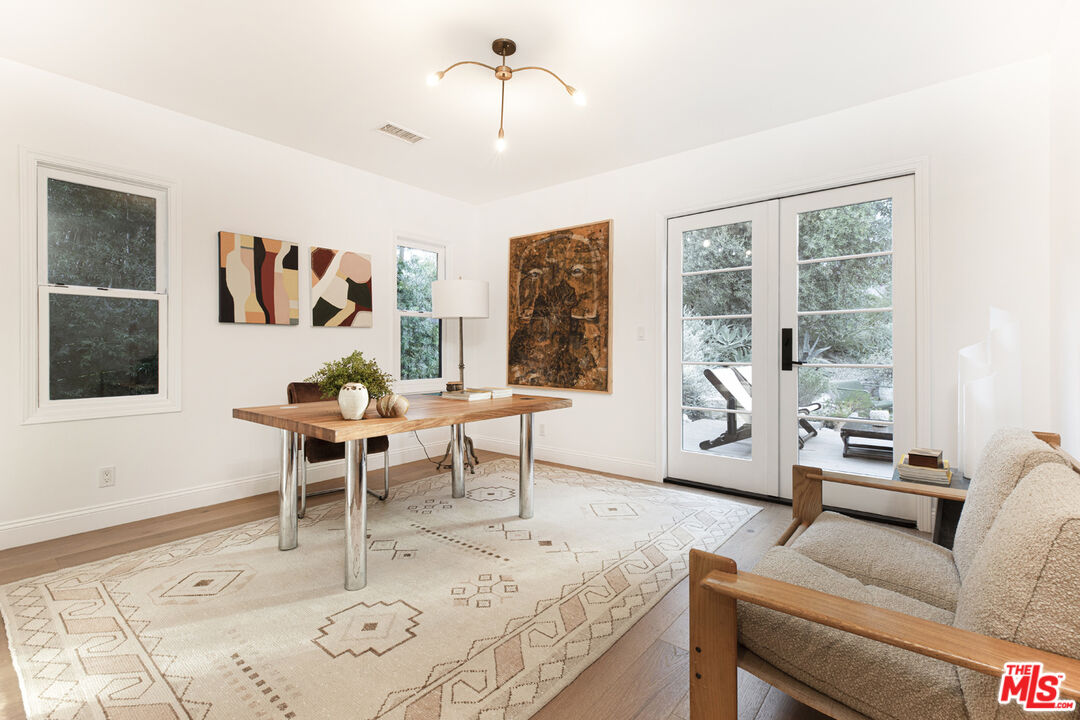 1411 Wellesley Drive Glendale, CA 91205 - Photo 18 of 32 a living room with furniture and a large window