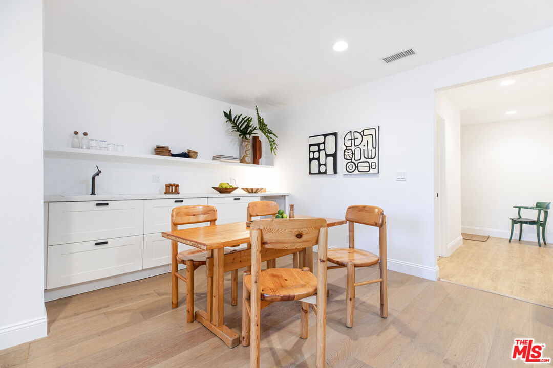 1411 Wellesley Drive Glendale, CA 91205 - Photo 22 of 32 a dining room with furniture and wooden floor