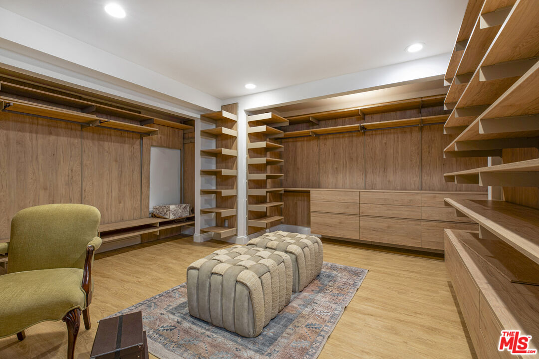 1411 Wellesley Drive Glendale, CA 91205 - Photo 23 of 32 a bedroom with a bed and a chair