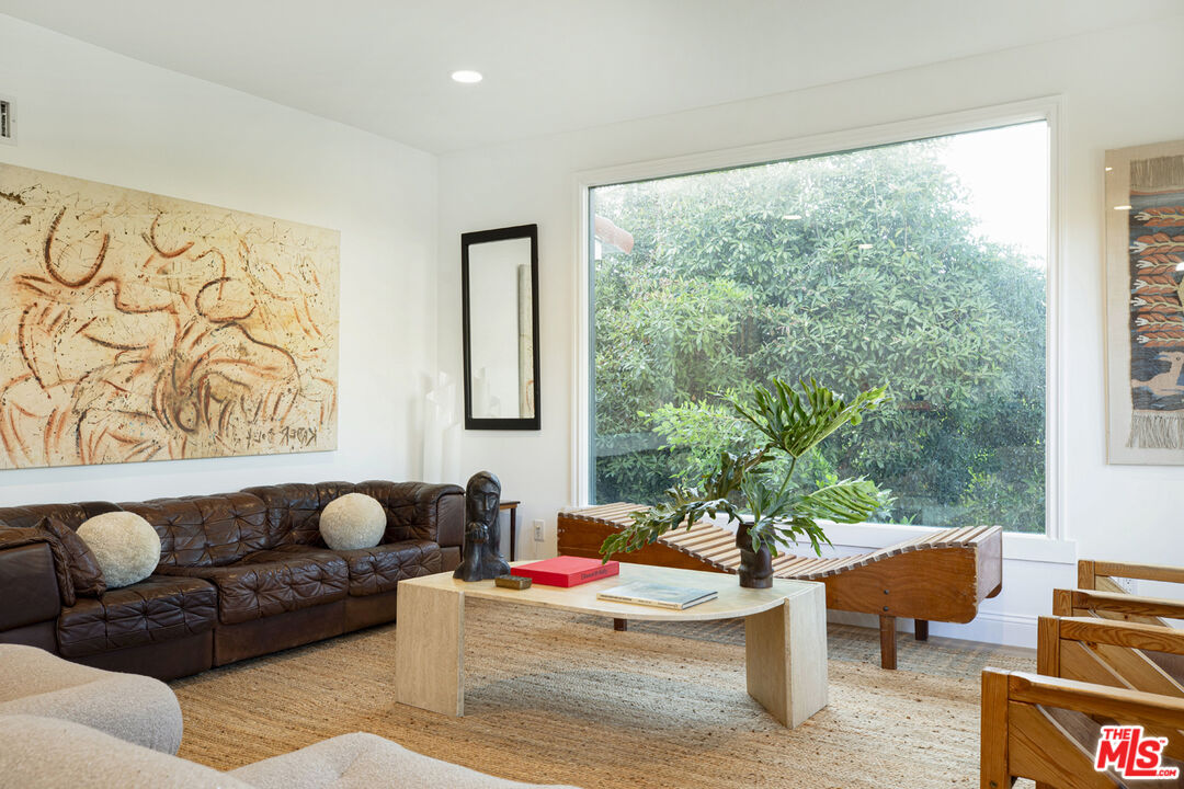1411 Wellesley Drive Glendale, CA 91205 - Photo 4 of 32 a living room with furniture and a large window