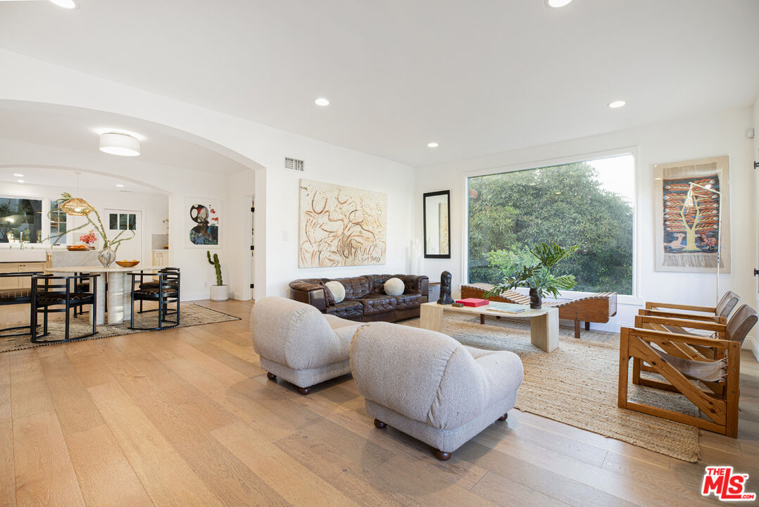 1411 Wellesley Drive Glendale, CA 91205 - Photo 5 of 32 a living room with furniture and large windows