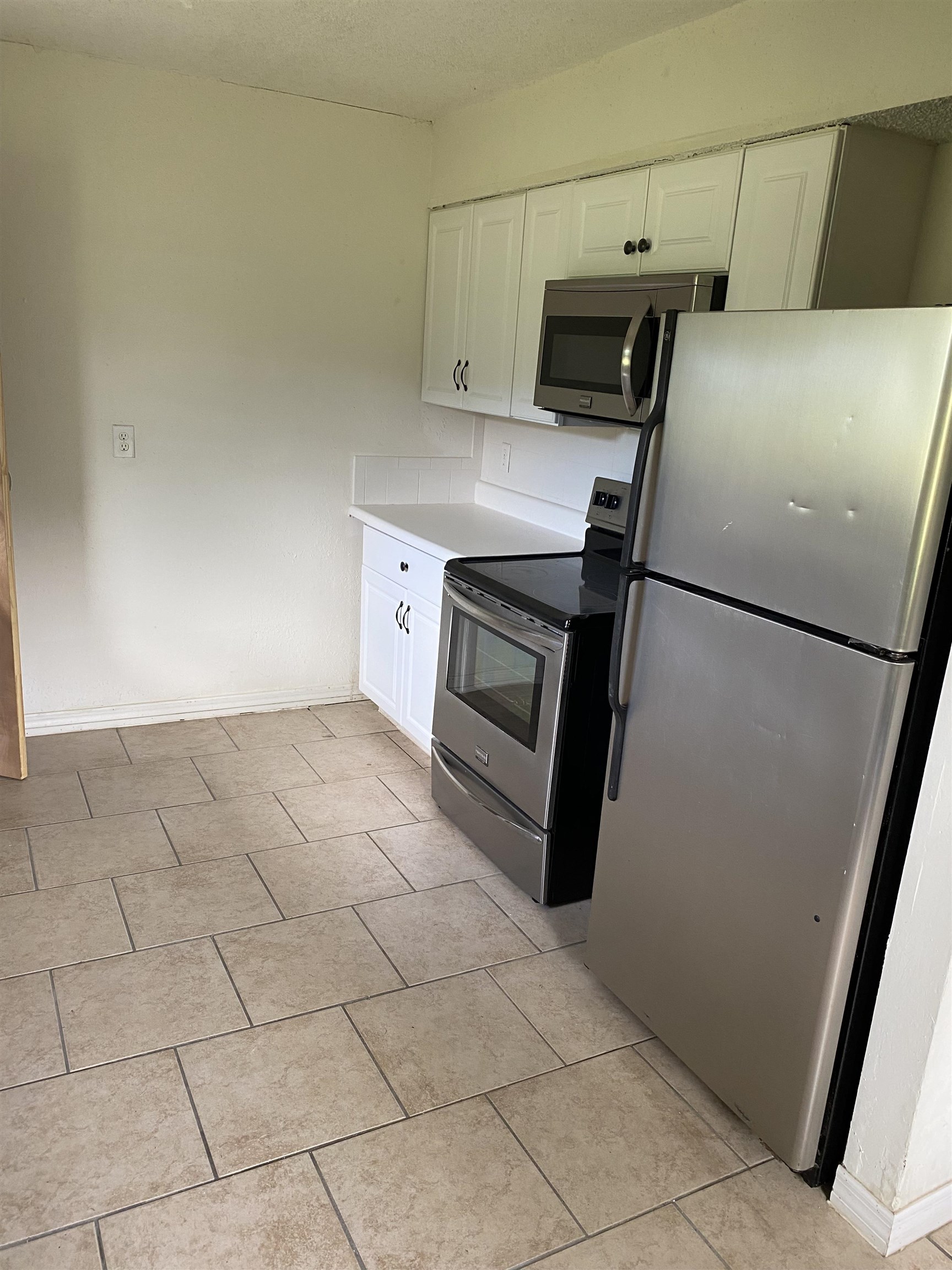 1880 Adams Acres Road St. Augustine, FL 32084 - Photo 2 of 7 a utility room with washer and dryer