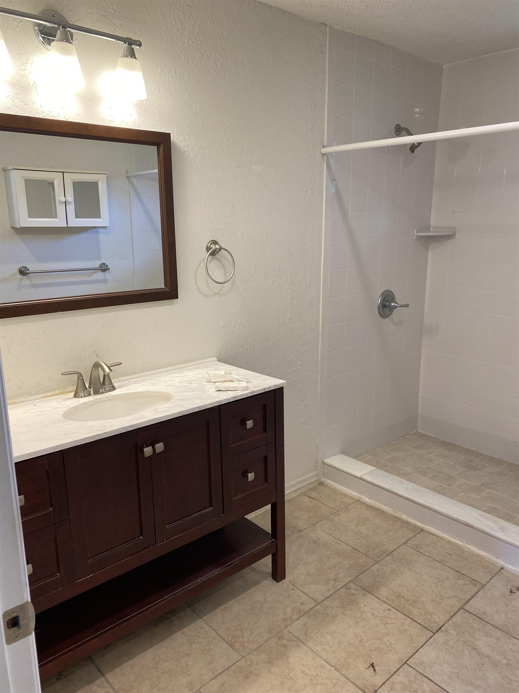 1880 Adams Acres Road St. Augustine, FL 32084 - Photo 7 of 7 a bathroom with a sink vanity and a mirror