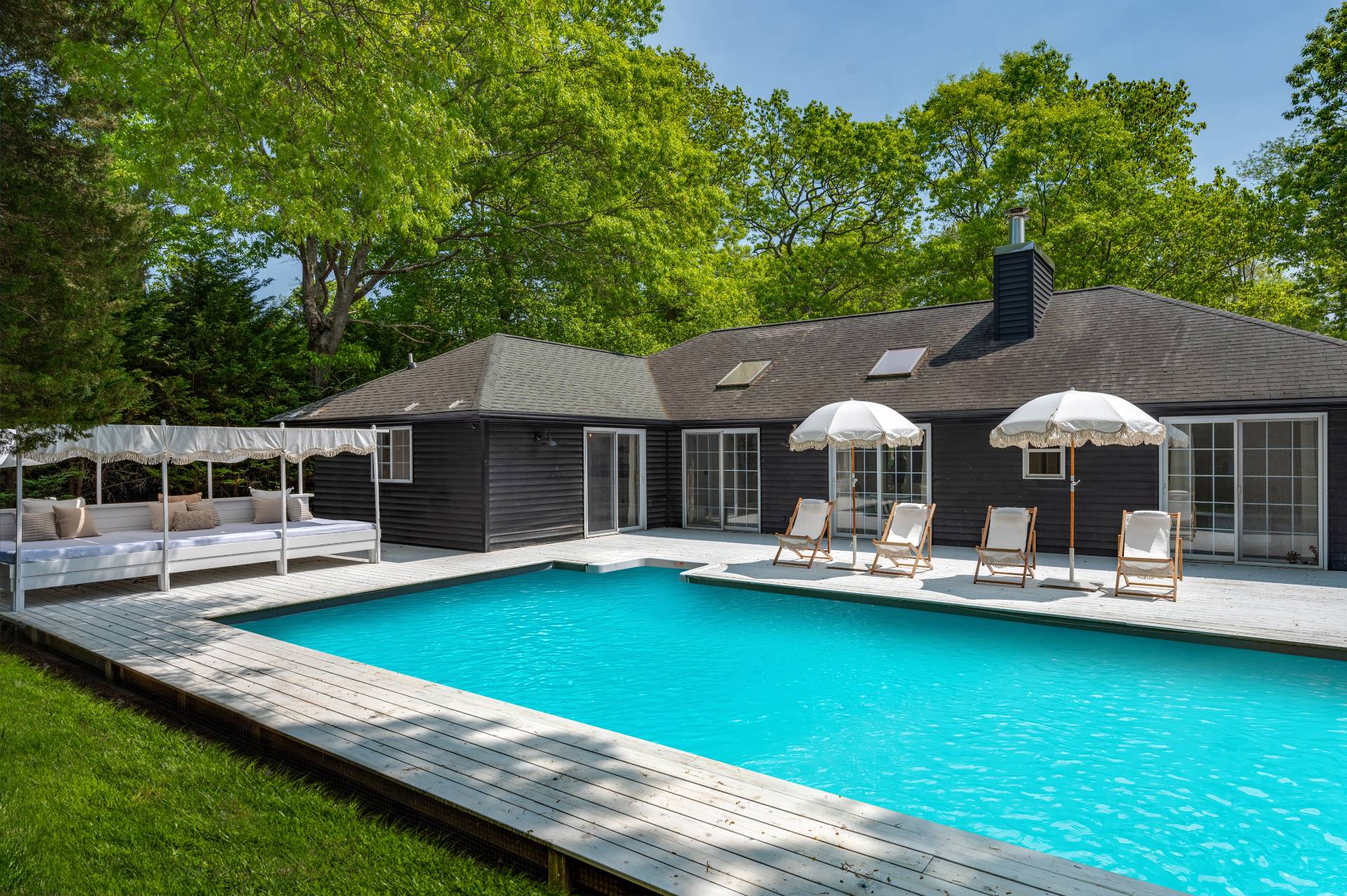 80 Beckys Path Bridgehampton, NY 11932 - Photo 12 of 13 a front view of a house with garden
