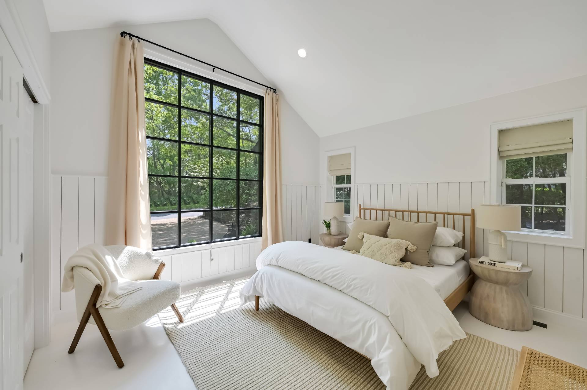 80 Beckys Path Bridgehampton, NY 11932 - Photo 8 of 13 a bedroom with a bed and a large window