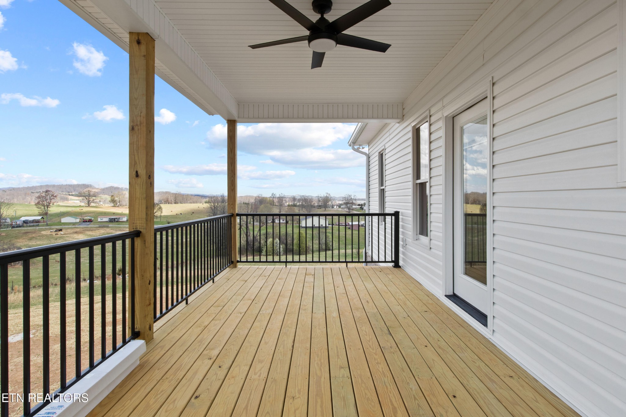 310 Pocahontas Lane Rutledge, TN 37861 - Photo 47 of 49 a view of a balcony with wooden floor