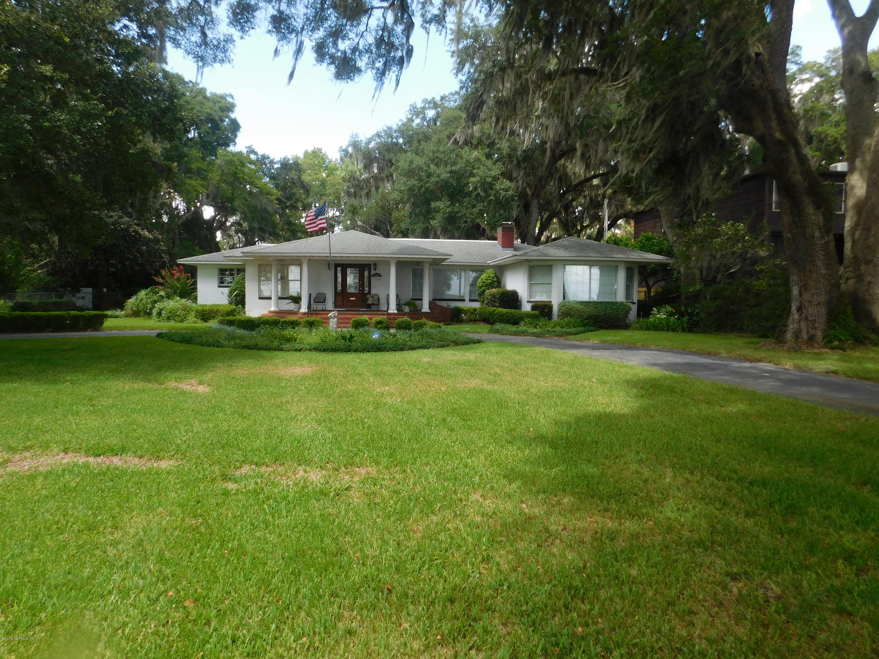 704 River Road Orange Park, FL 32073 - Photo 1 of 53 View from River Rd. w/ circular driveway