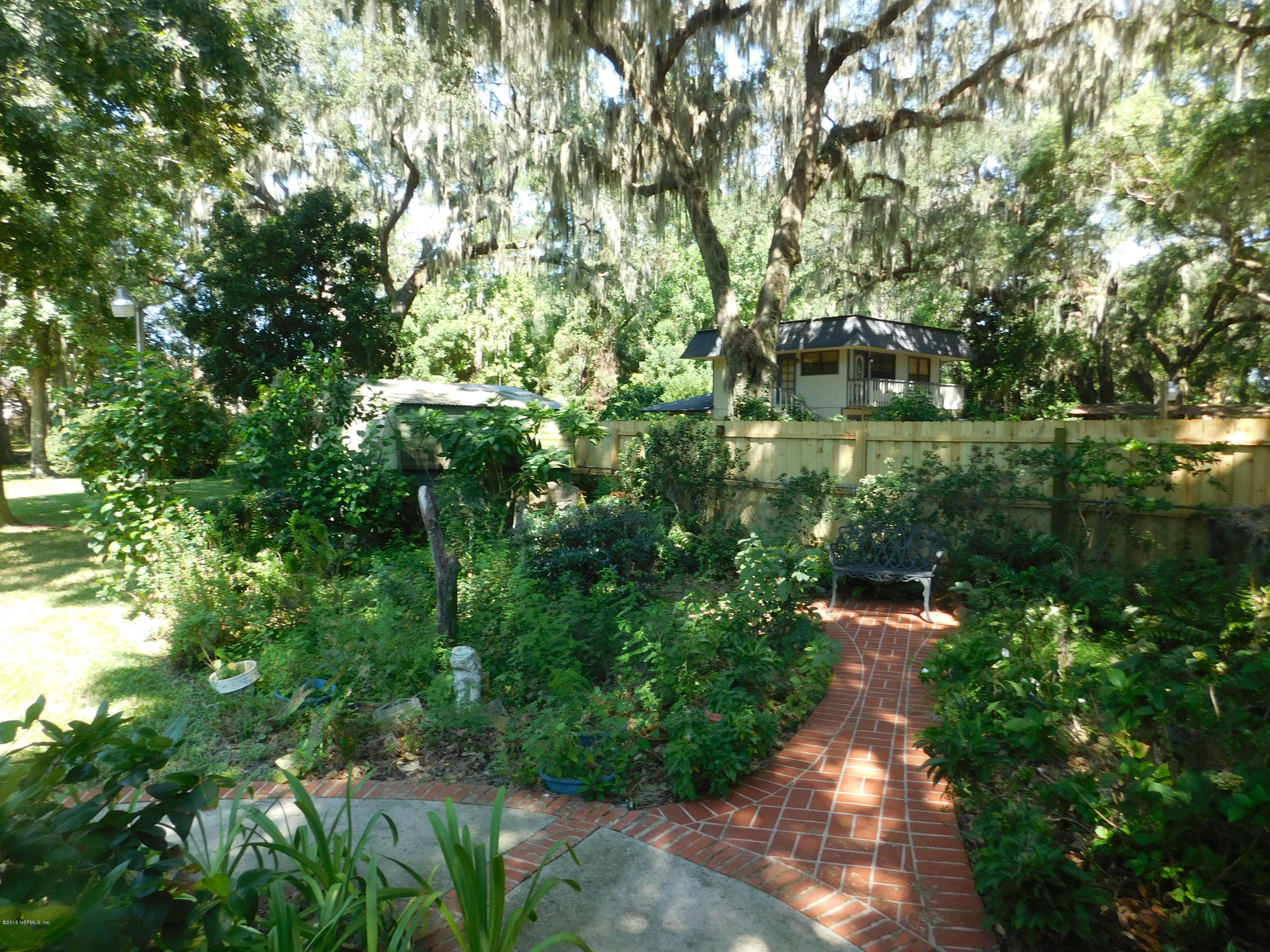704 River Road Orange Park, FL 32073 - Photo 12 of 53 Brick Walkway to Patio