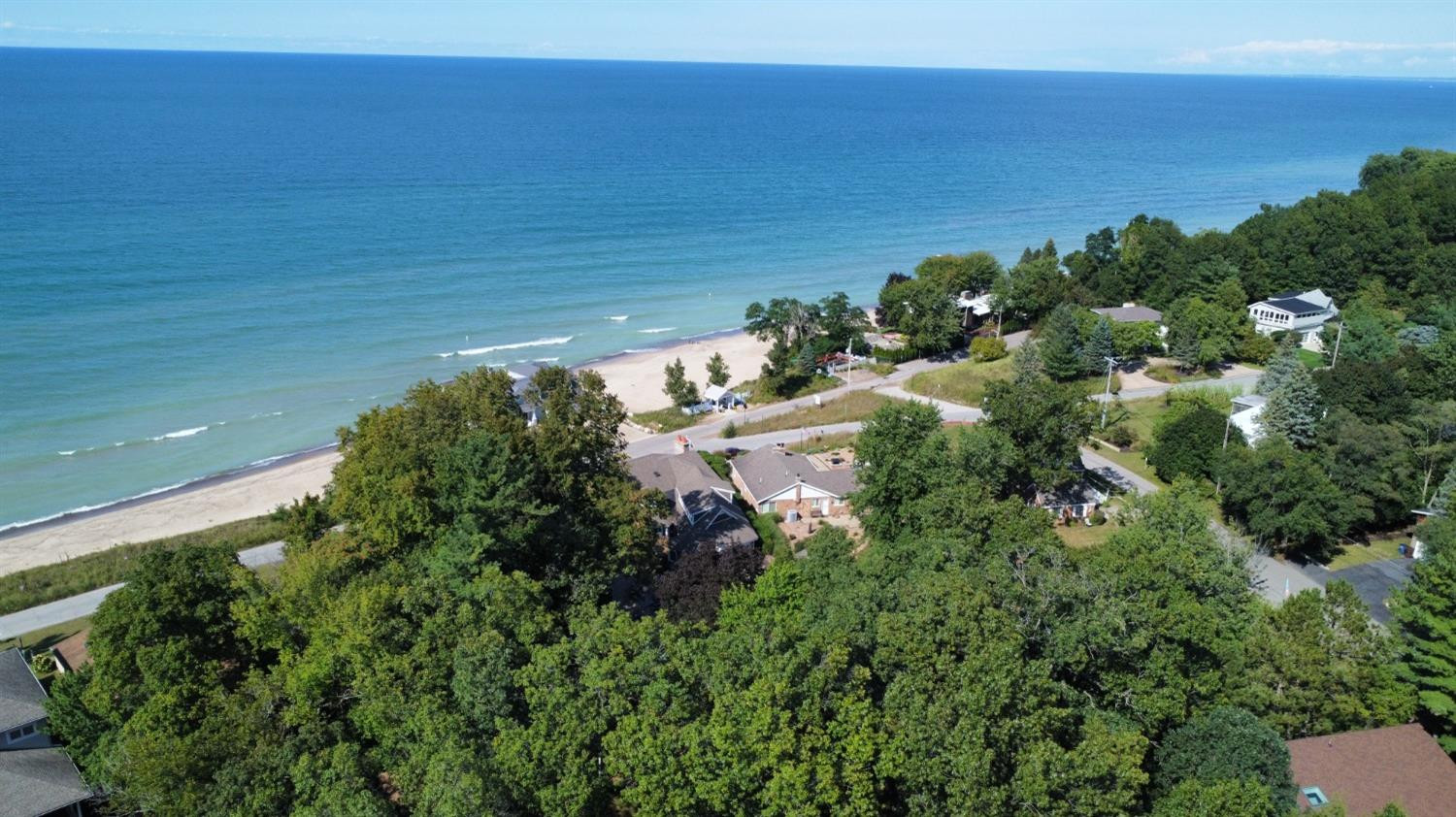 0 Sunset Trail Michigan City, IN 46360 - Photo 11 of 16 a view of a lake with a yard
