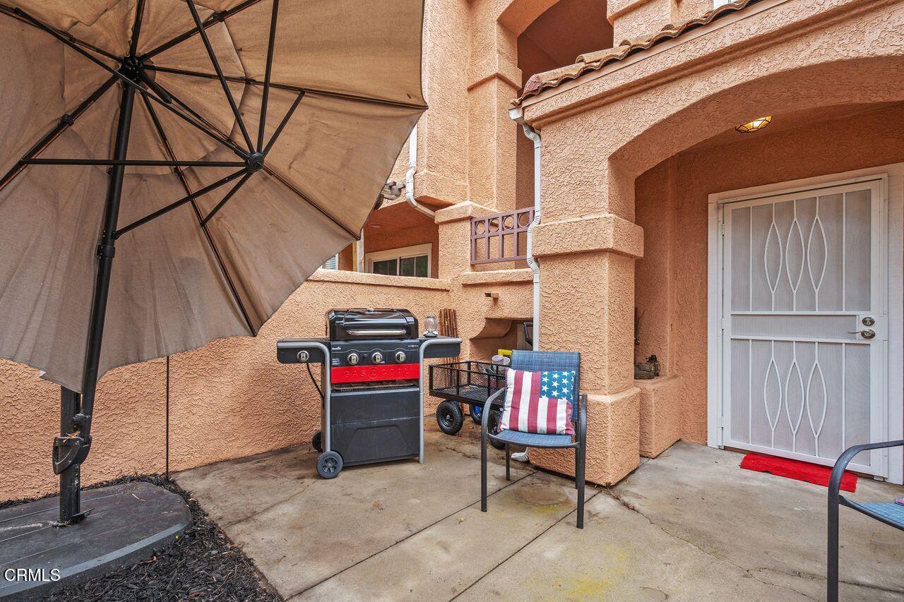 807 Kingfisher Way Oxnard, CA 93030 - Photo 20 of 45 a backyard of a house with chairs and a couch
