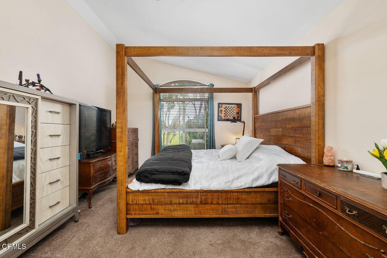 807 Kingfisher Way Oxnard, CA 93030 - Photo 8 of 45 a spacious bedroom with a bed and a dresser