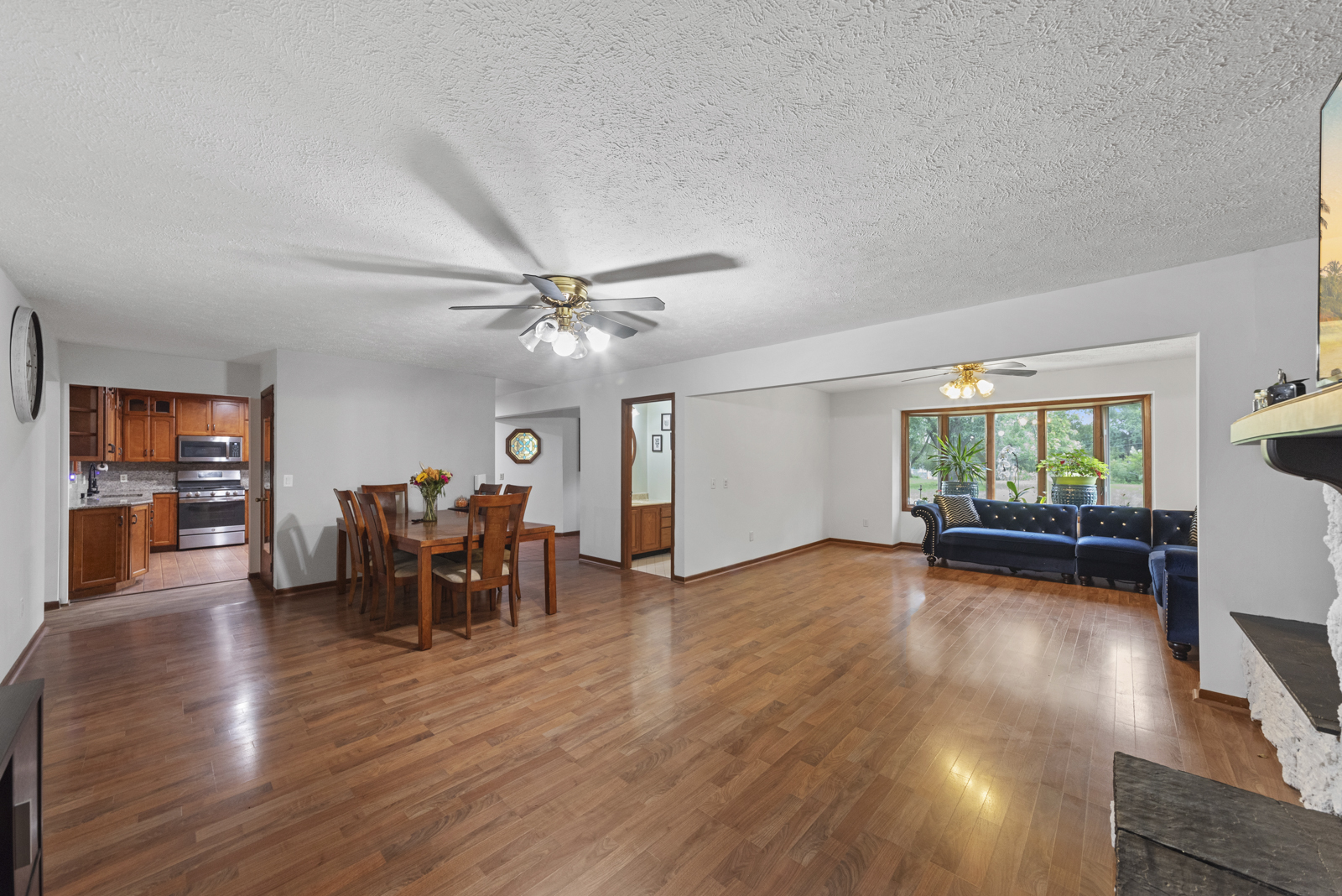 23949 West McClintock Road Channahon, IL 60410 - Photo 6 of 21 a view of a livingroom with furniture window and wooden floor