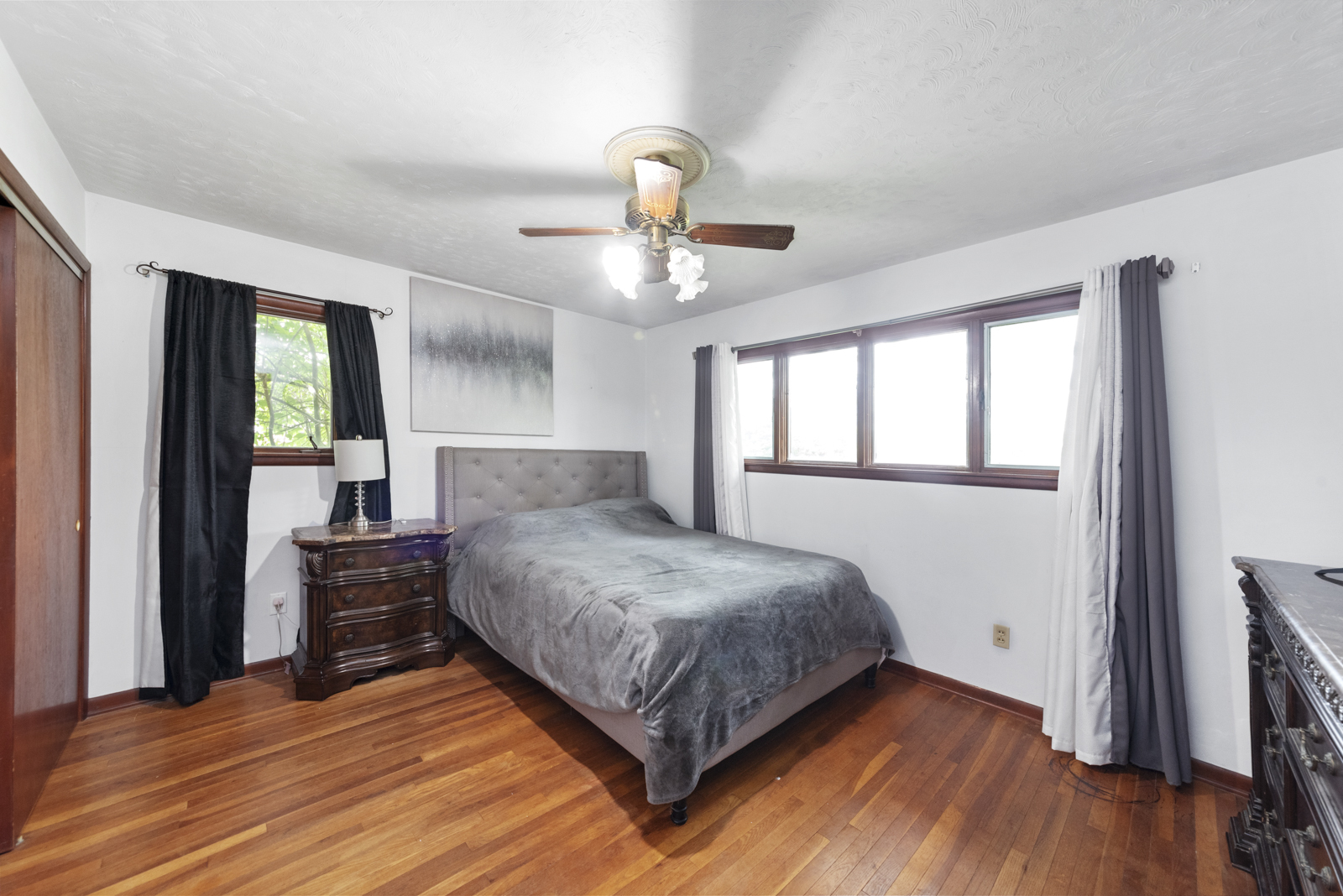 23949 West McClintock Road Channahon, IL 60410 - Photo 10 of 21 a bedroom with a bed and wooden floor
