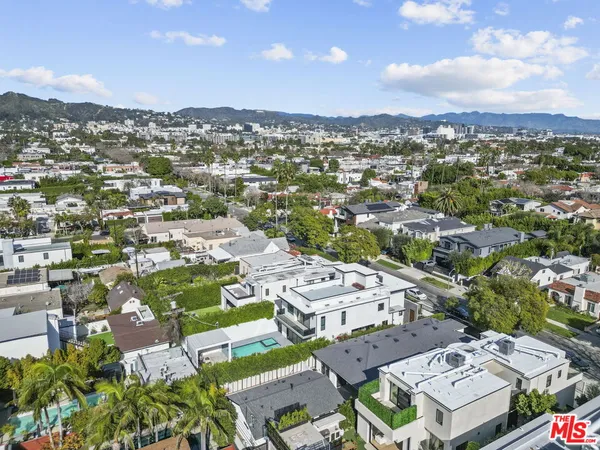 an aerial view of a city with lots of residential buildings
