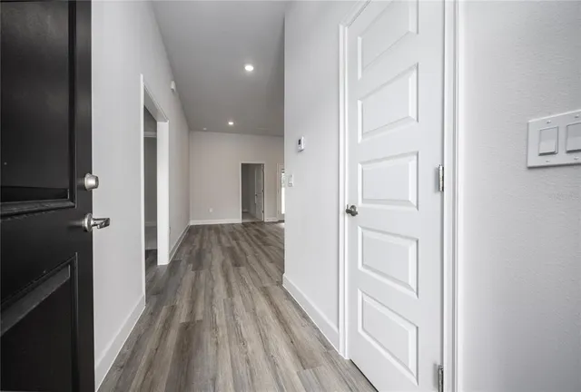 a view of a hallway with closet