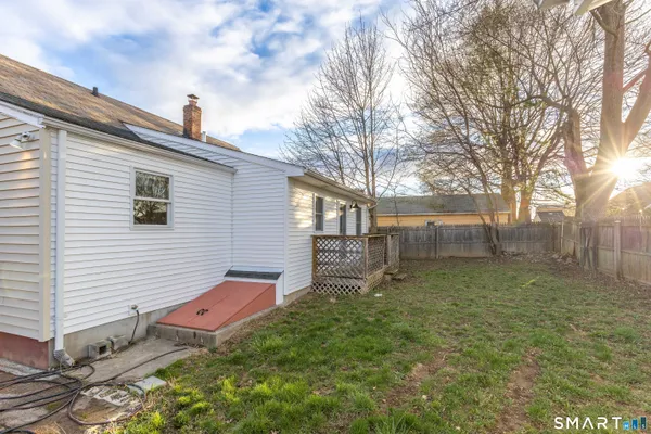 a backyard of a house with lots of green space