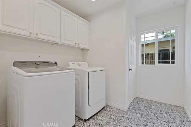 a view of hallway with wooden floor