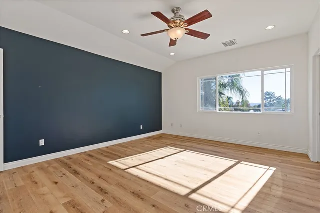 a bathroom with a toilet and a bathtub