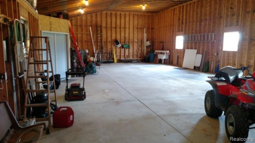 11633 Wilkes Road Yale, MI 48097 - Photo 30 of 30 This view shows another angle of the interior of the pole barn.