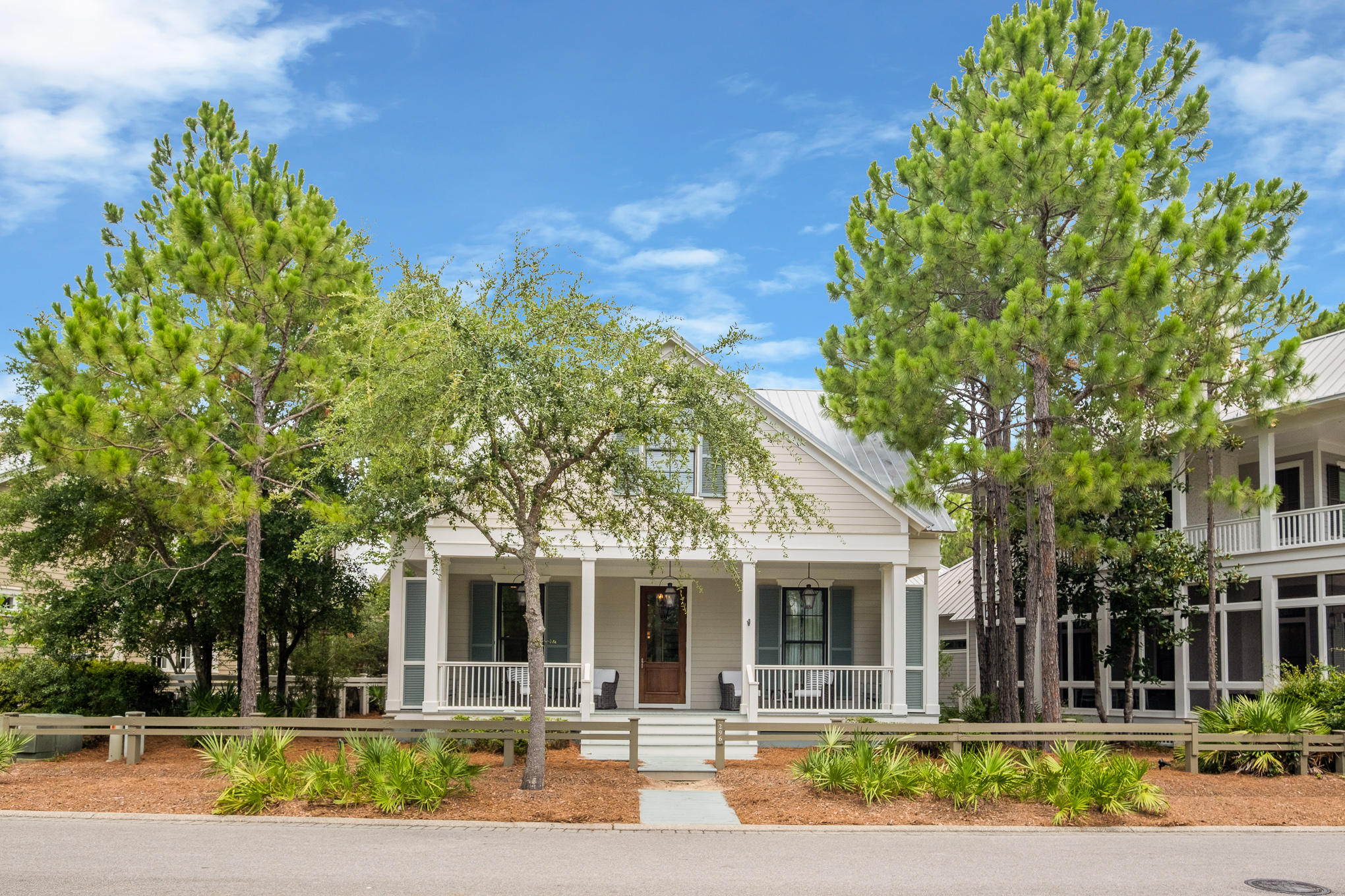 296 Pine Needle Way Santa Rosa Beach, FL 32459 - Photo 15 of 61 a front view of a house with a yard