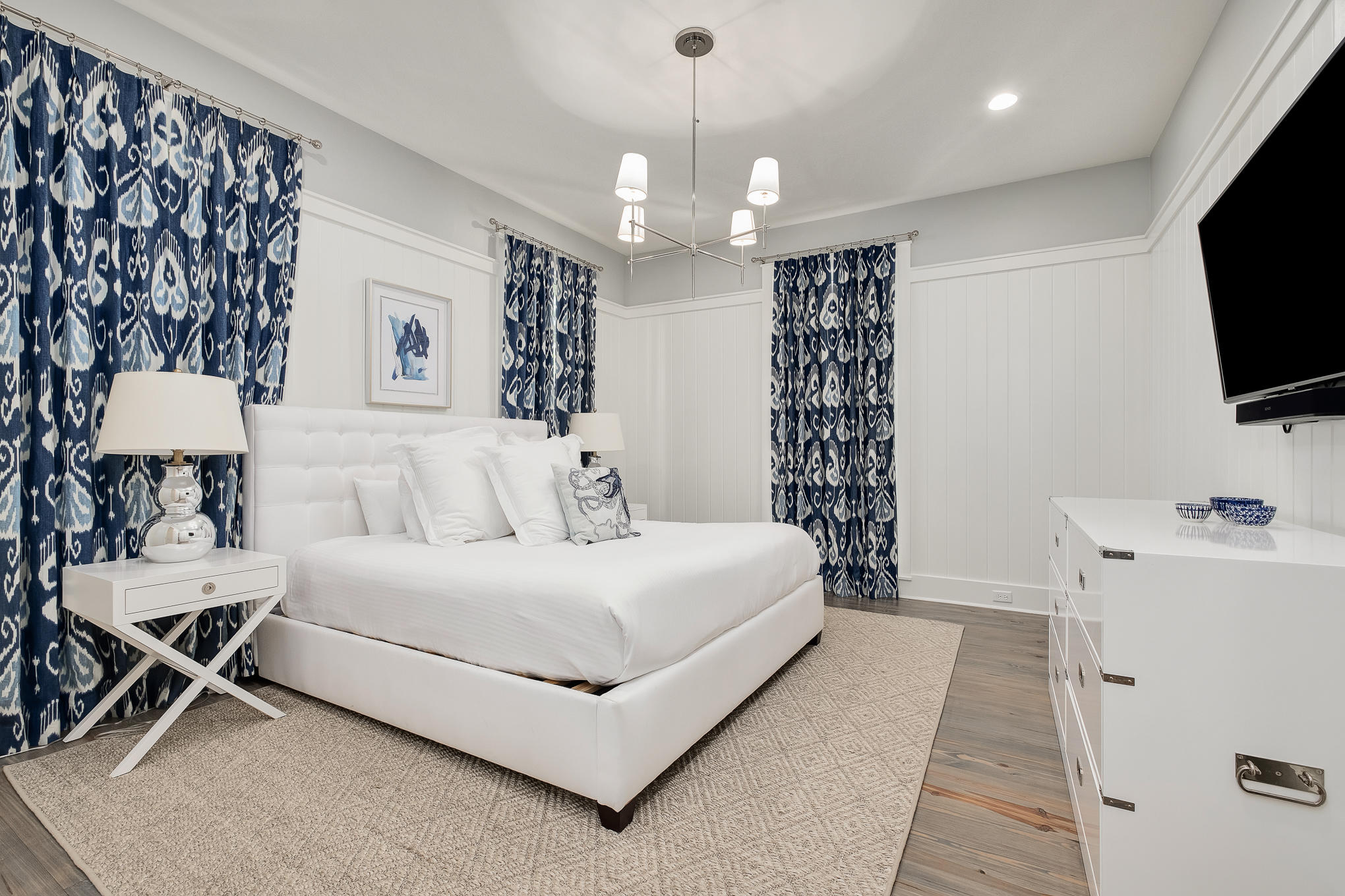 296 Pine Needle Way Santa Rosa Beach, FL 32459 - Photo 36 of 61 a spacious bedroom with a bed and a flat screen tv