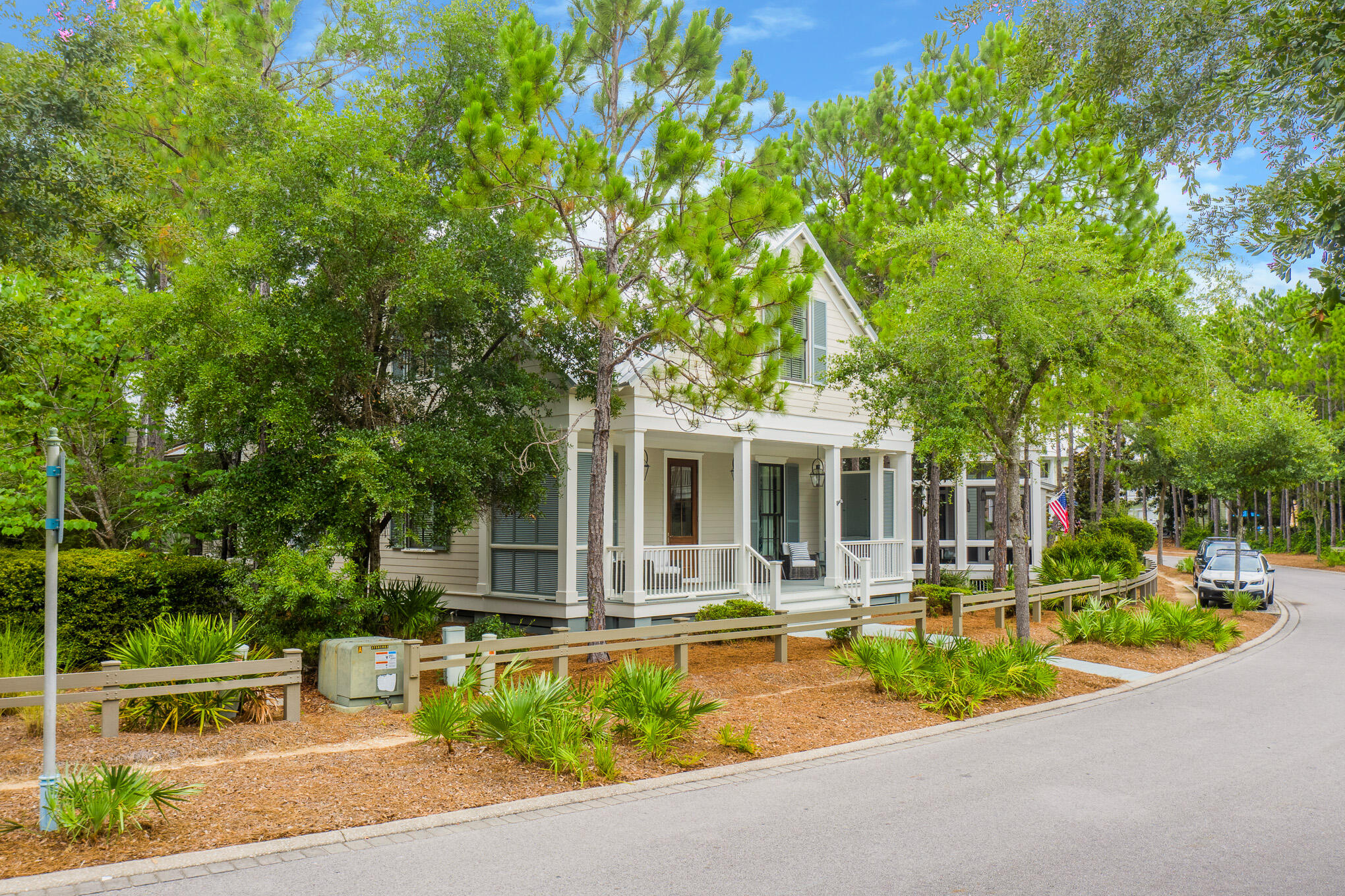 296 Pine Needle Way Santa Rosa Beach, FL 32459 - Photo 39 of 61 a front view of a house with swimming pool and porch