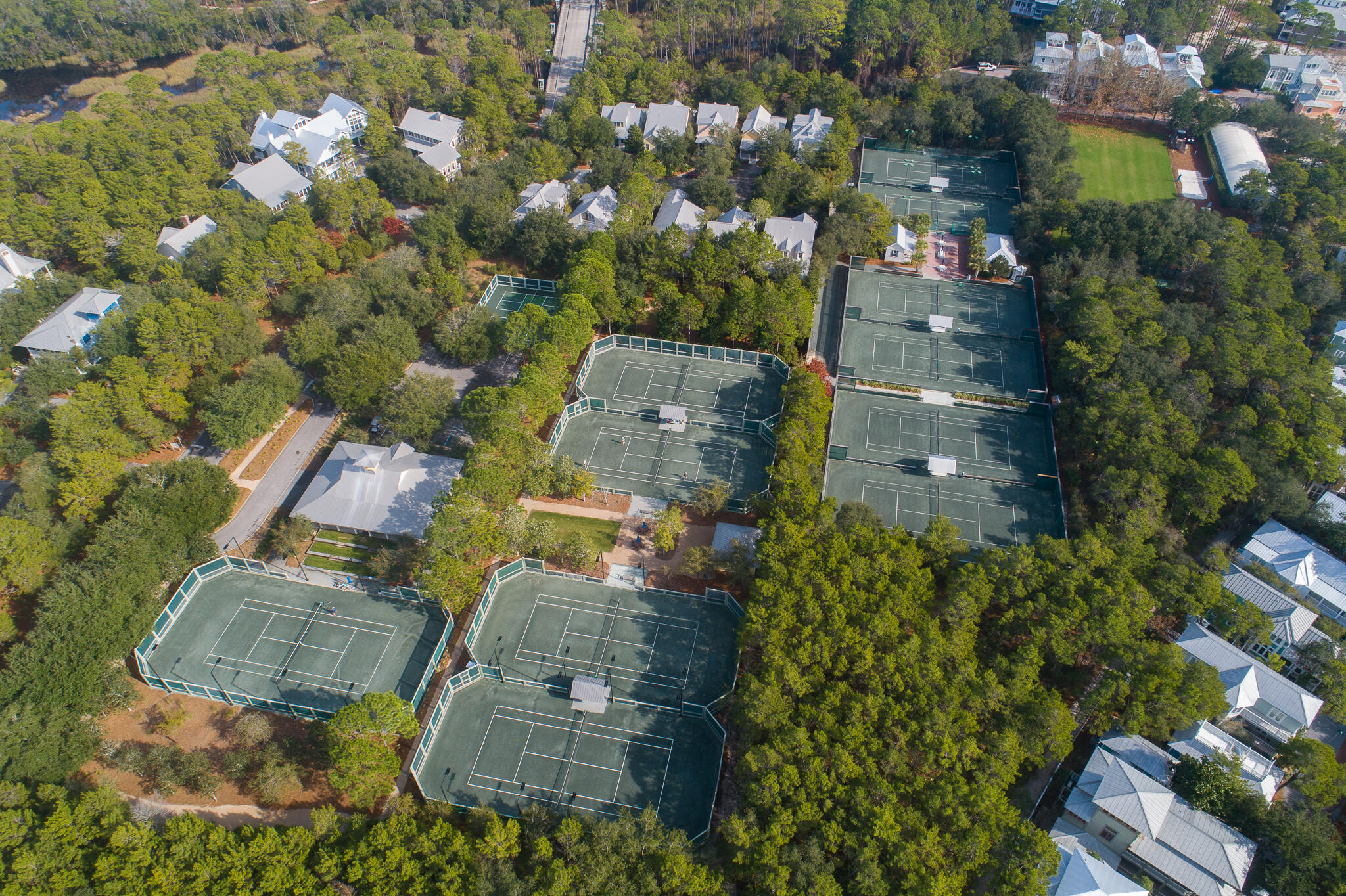 296 Pine Needle Way Santa Rosa Beach, FL 32459 - Photo 60 of 61 an aerial view of residential houses with outdoor space