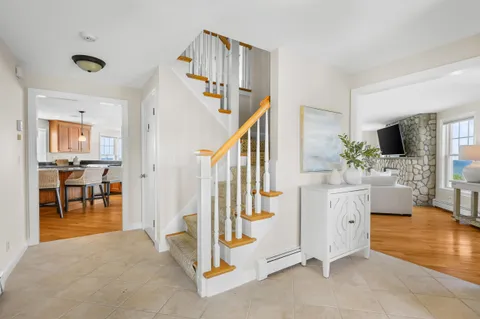 a view of living room kitchen and dining room