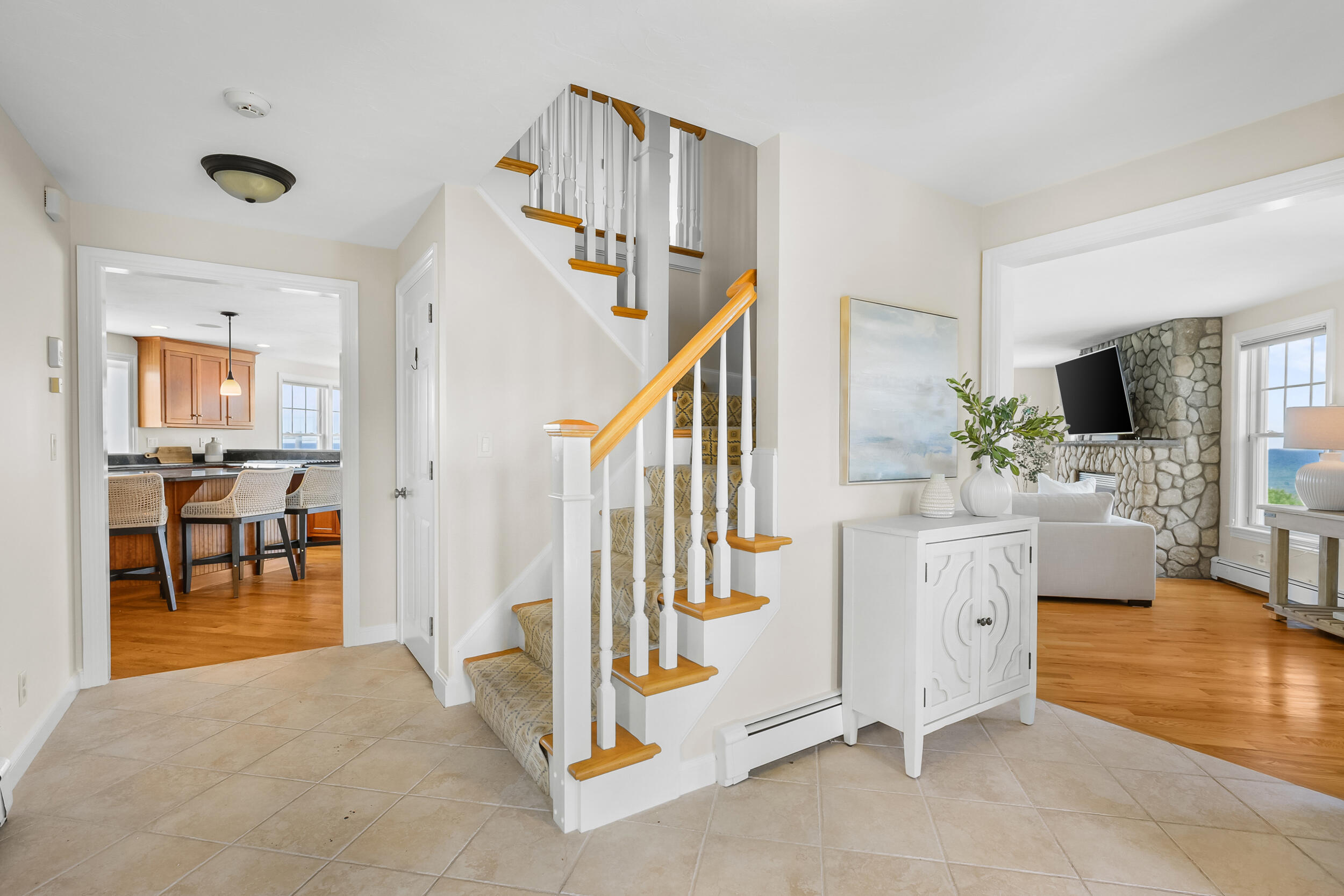 67 Phillips Road Sagamore Beach, MA 02562 - Photo 18 of 43 a view of living room kitchen and dining room