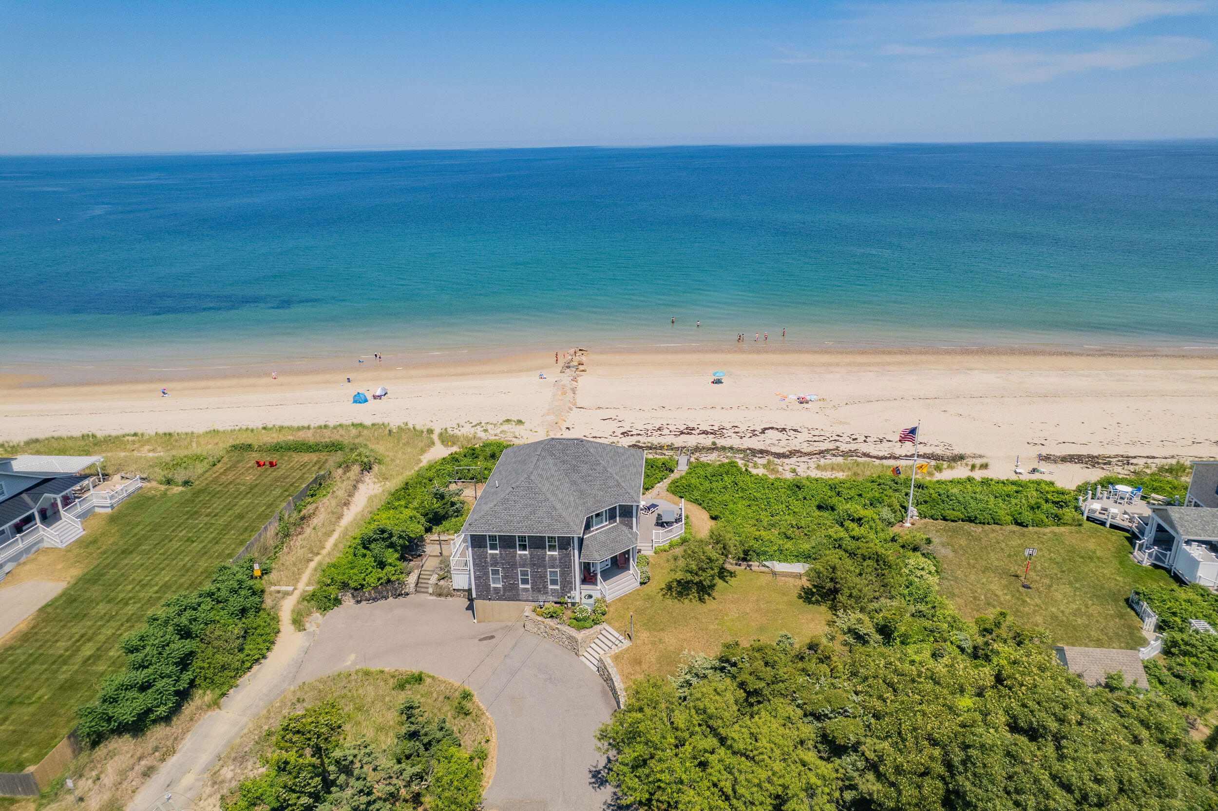 67 Phillips Road Sagamore Beach, MA 02562 - Photo 2 of 43 an aerial view of a house with a yard