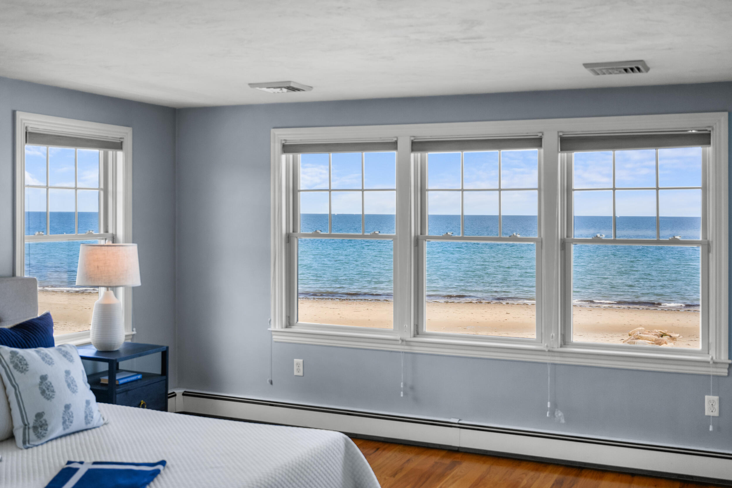 67 Phillips Road Sagamore Beach, MA 02562 - Photo 22 of 43 a bedroom with a bed and a window