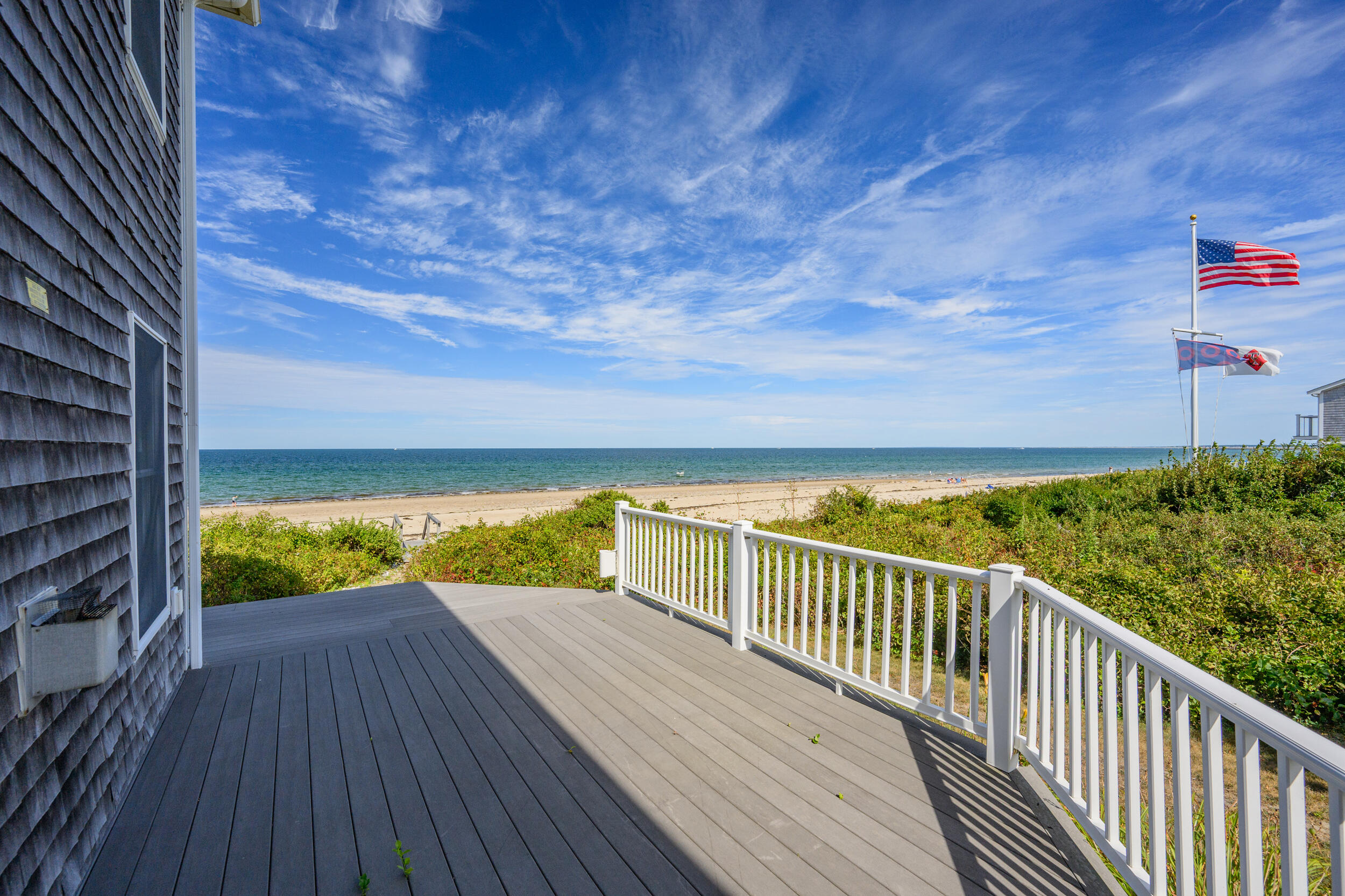 67 Phillips Road Sagamore Beach, MA 02562 - Photo 27 of 43 a view of balcony with wooden floor & fence