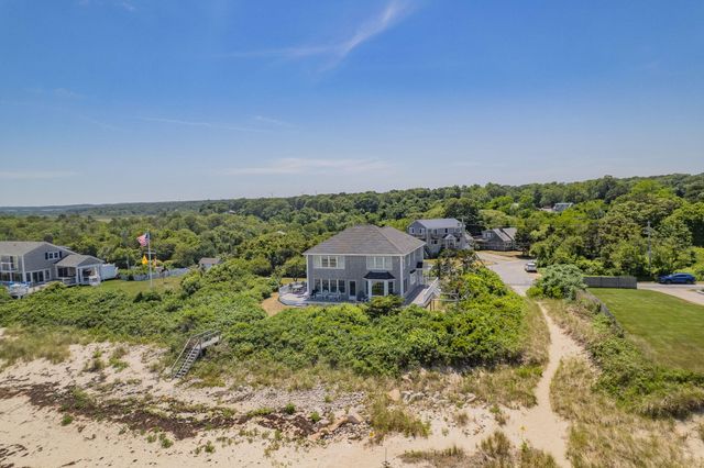 an aerial view of a house with a garden