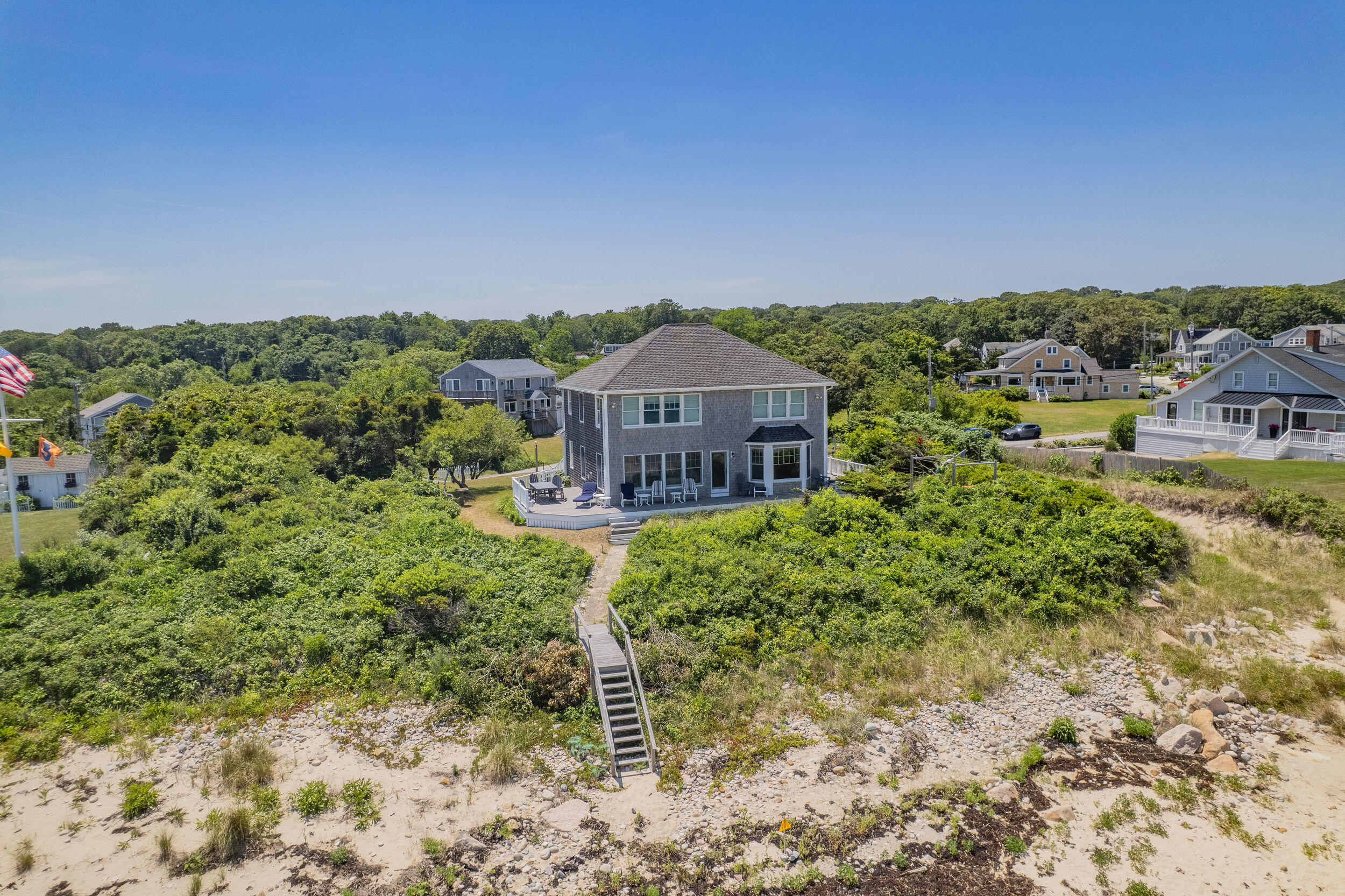 67 Phillips Road Sagamore Beach, MA 02562 - Photo 36 of 43 a front view of a house with a yard