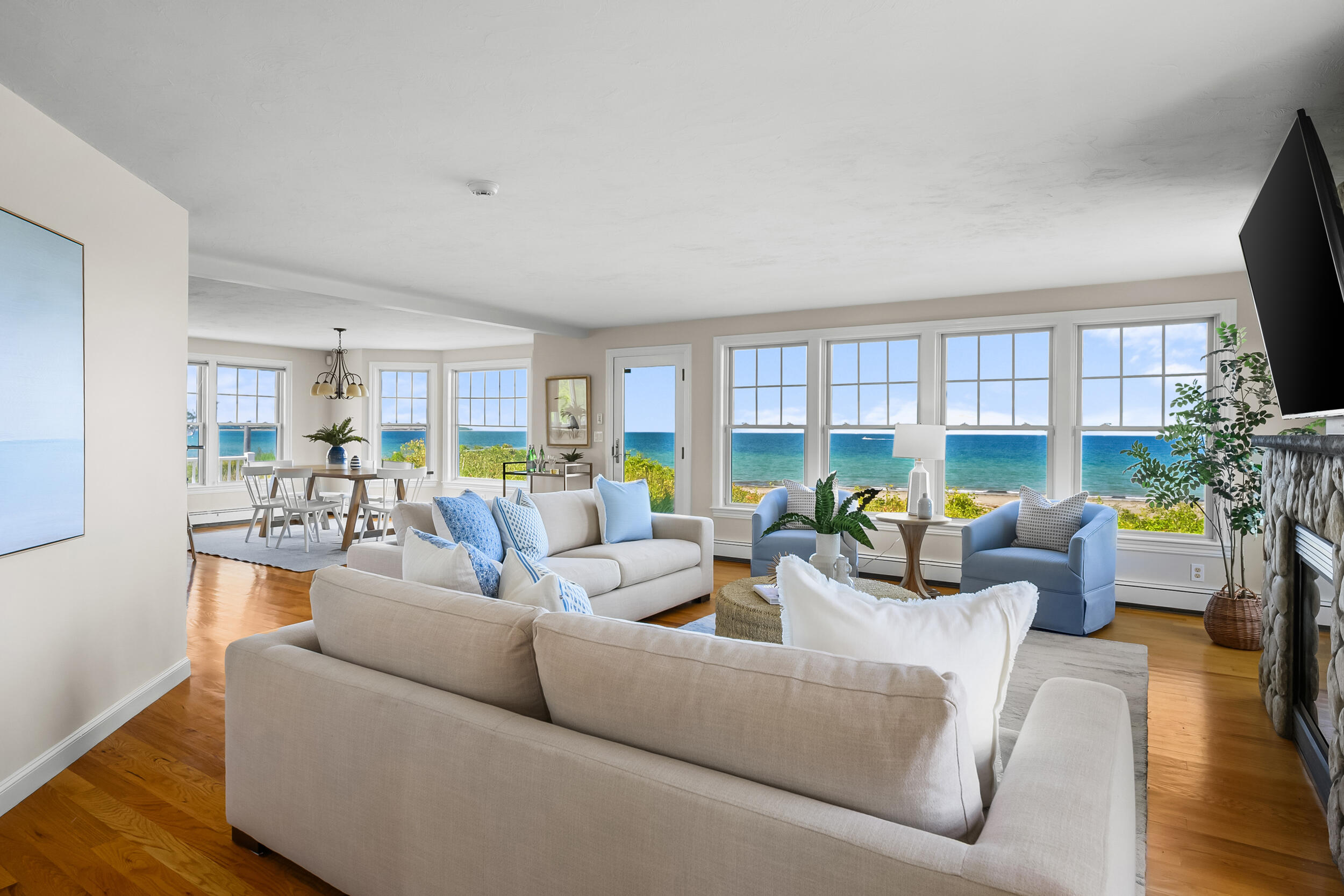 67 Phillips Road Sagamore Beach, MA 02562 - Photo 6 of 43 a living room with furniture and a wooden floor