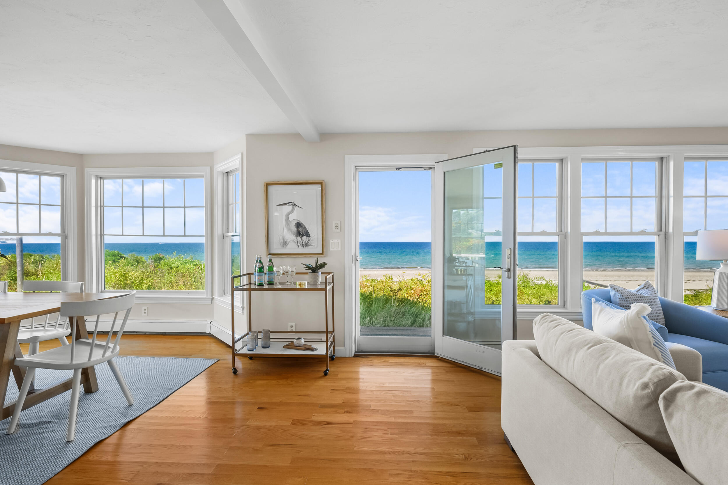 67 Phillips Road Sagamore Beach, MA 02562 - Photo 9 of 43 a living room with furniture and a large window