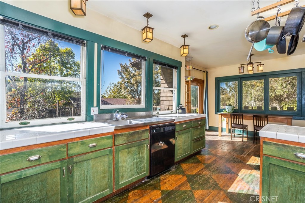5289 Ellenwood Drive Eagle Rock, CA 90041 - Photo 12 of 28 a large kitchen with lots of counter space and windows