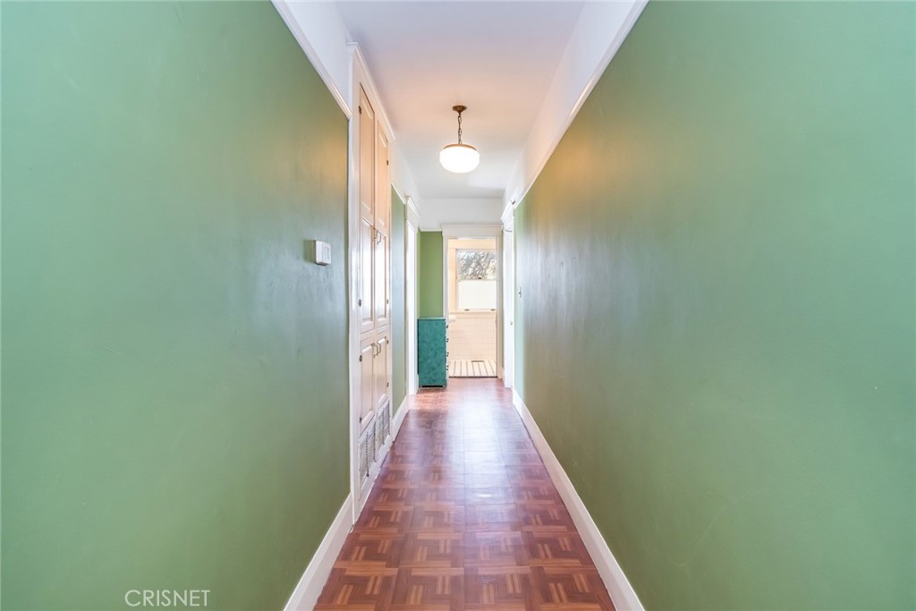 5289 Ellenwood Drive Eagle Rock, CA 90041 - Photo 16 of 28 a view of a hallway with wooden floor