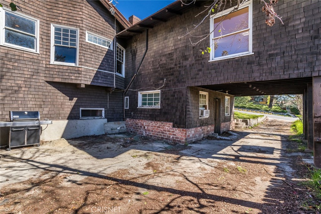 5289 Ellenwood Drive Eagle Rock, CA 90041 - Photo 17 of 28 a front view of a house with a floor to ceiling windows