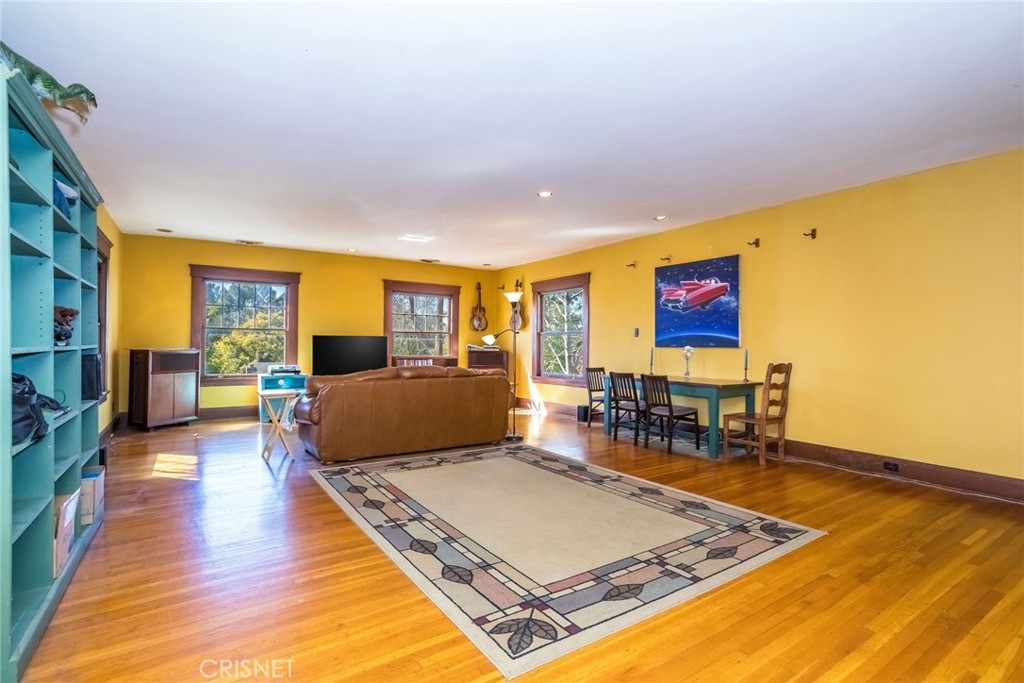 5289 Ellenwood Drive Eagle Rock, CA 90041 - Photo 4 of 28 a living room with furniture pool table and a flat screen tv