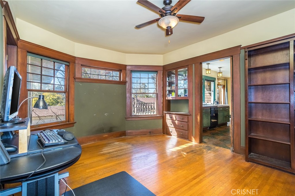 5289 Ellenwood Drive Eagle Rock, CA 90041 - Photo 10 of 28 a living room with furniture and a flat screen tv