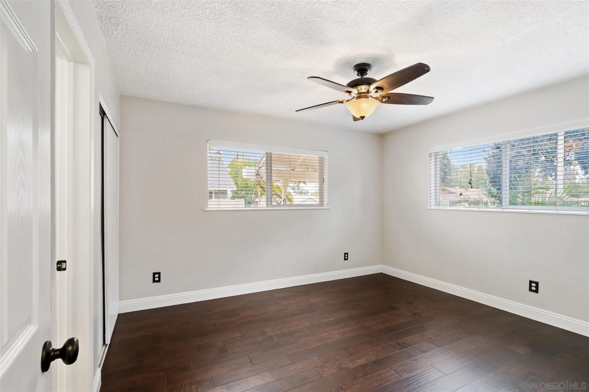 7752 Bayberry Avenue Riverside, CA 92504 - Photo 16 of 27 a view of empty room with wooden floor