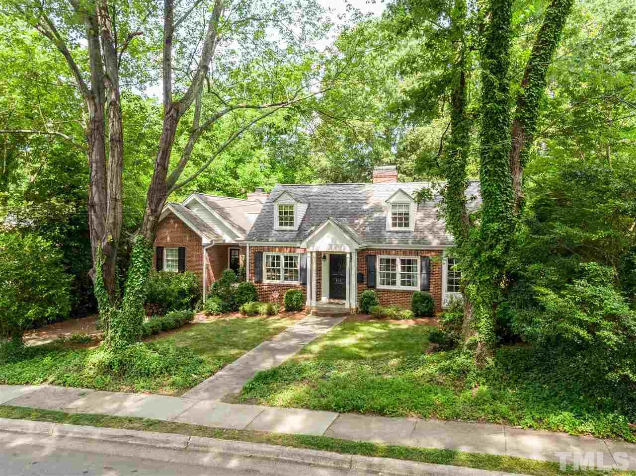 512 Burton Street Raleigh, NC 27608 - Photo 1 of 24 front view of a house with a yard