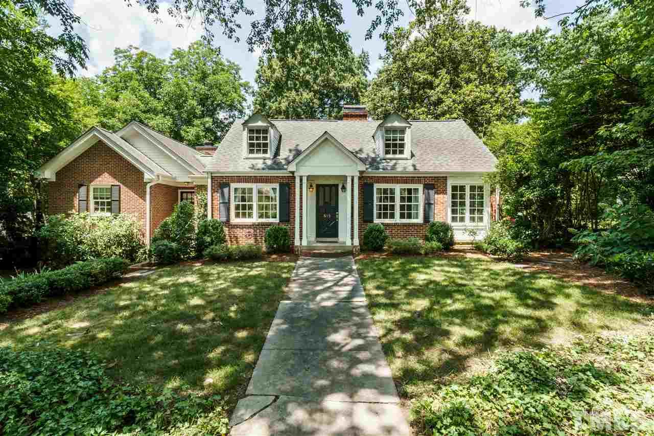 512 Burton Street Raleigh, NC 27608 - Photo 2 of 24 a front view of a house with a garden