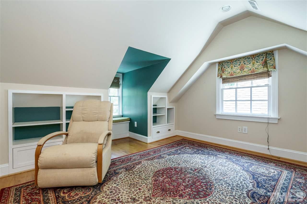 512 Burton Street Raleigh, NC 27608 - Photo 17 of 24 a living room with furniture and a window
