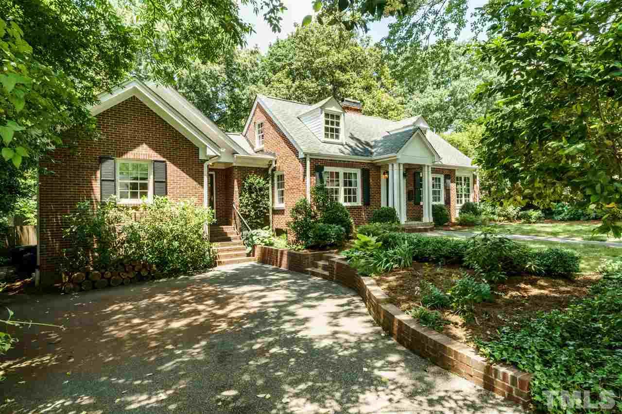 512 Burton Street Raleigh, NC 27608 - Photo 4 of 24 a front view of a house with a yard