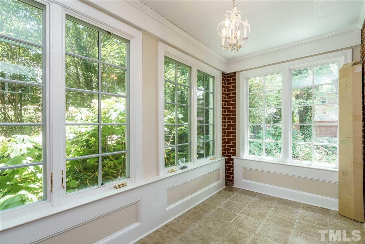 512 Burton Street Raleigh, NC 27608 - Photo 8 of 24 a view of an empty room with a window