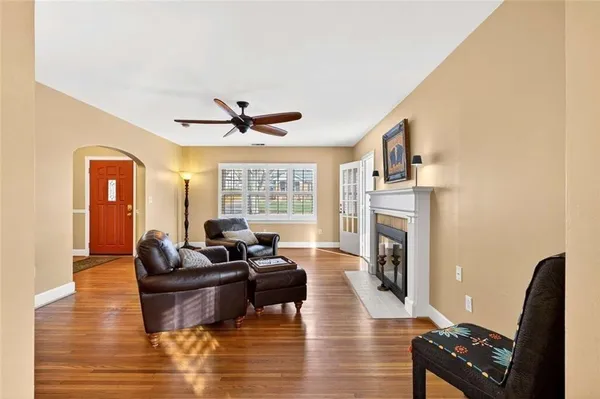 a kitchen with cabinets appliances a sink and a counter top space