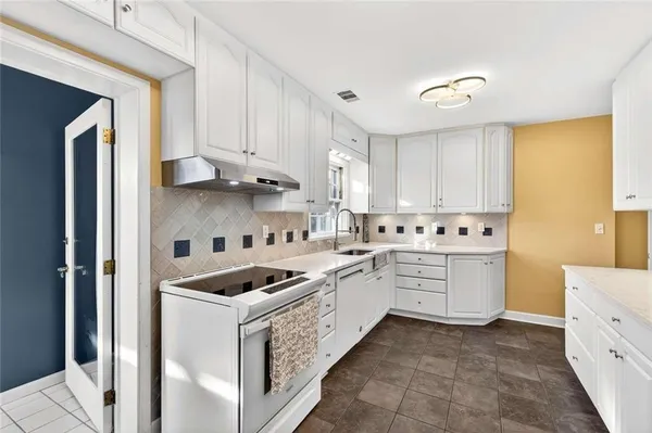 a living room with furniture and a couch