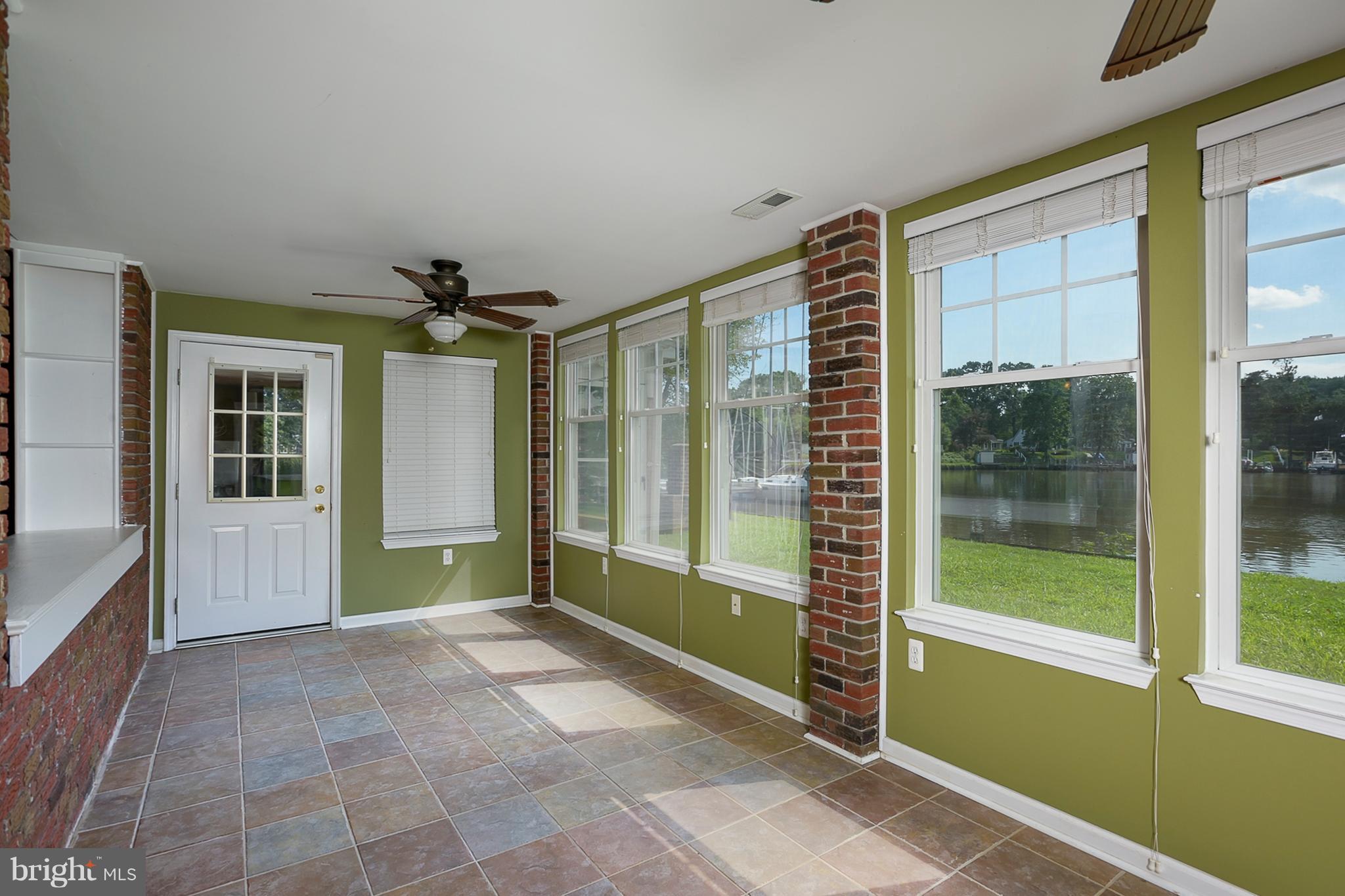 8216 Riverside Drive Pasadena, MD 21122 - Photo 12 of 30 Sunroom with water views